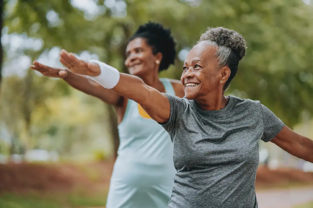 residents of a Life Plan Community doing yoga outside