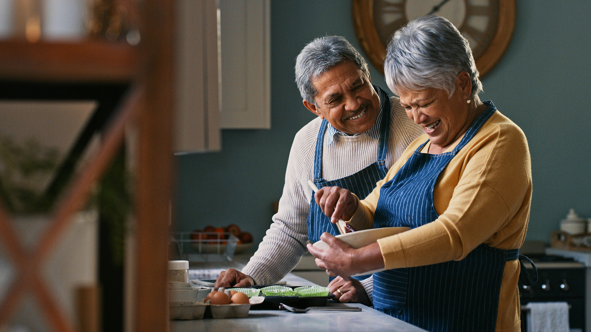 senior couple baking together